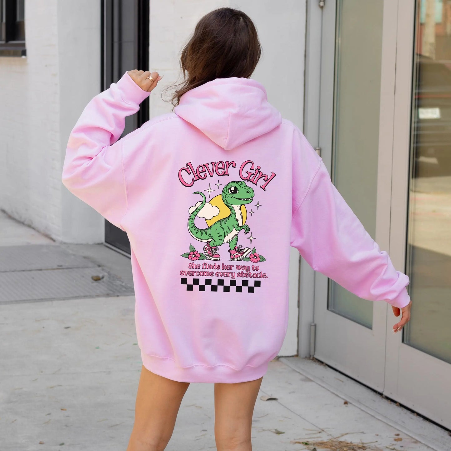 Clever Girl Dino hoodie with cute dinosaur design, perfect for playful fashion and girl power.