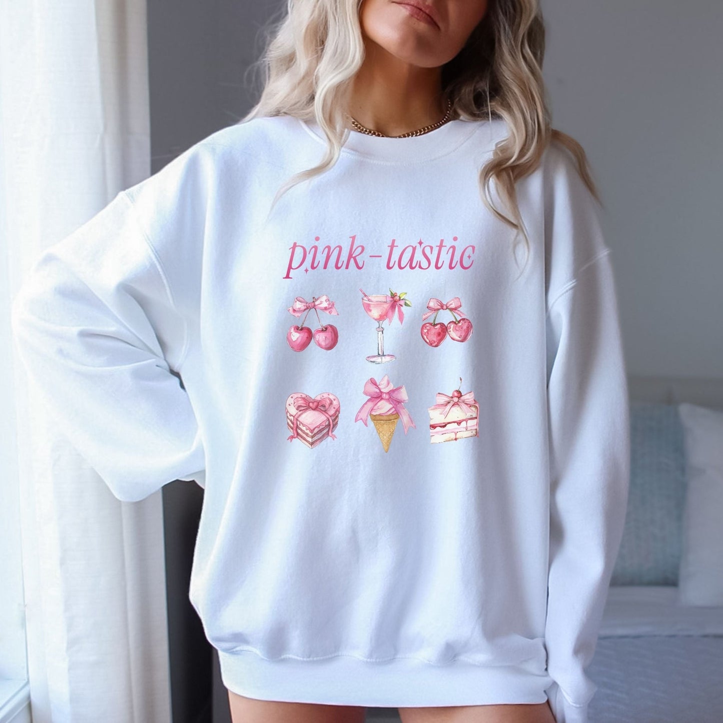 Pink-tastic sweatshirt with a feminine design featuring pink cherries, desserts, and a cocktail.