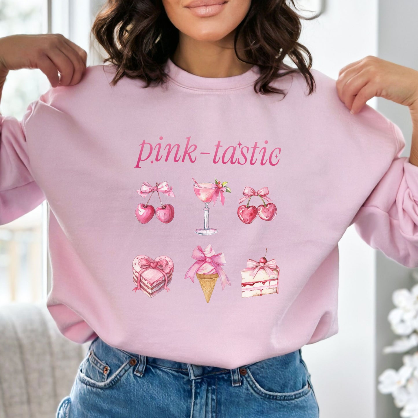 Pink-tastic sweatshirt with a feminine design featuring pink cherries, desserts, and a cocktail.