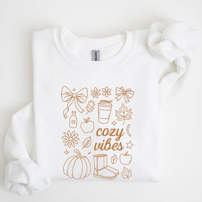 Cozy Vibes fall aesthetic sweatshirt with bows, pumpkins, coffee cup, and autumn leaves