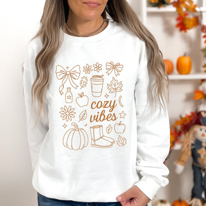 Cozy Vibes fall aesthetic sweatshirt with bows, pumpkins, coffee cup, and autumn leaves