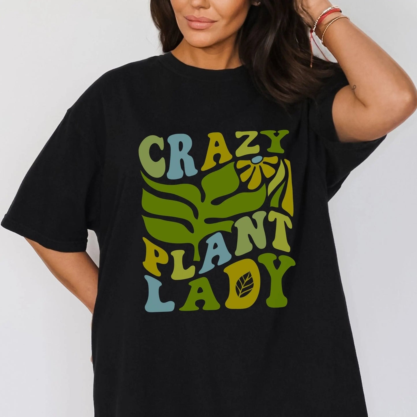 "Crazy Plant Lady" shirt, 100% cotton, retro plant design, 4 colors, perfect for plant lovers.