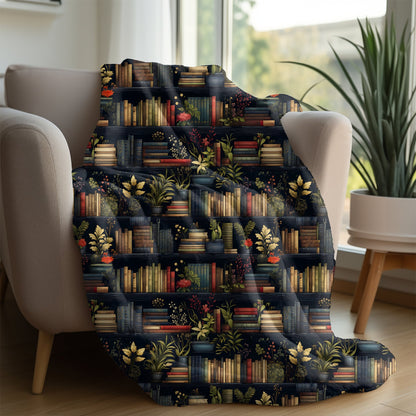 Cozy bookshelf blanket with plant and book design, perfect for book lovers.