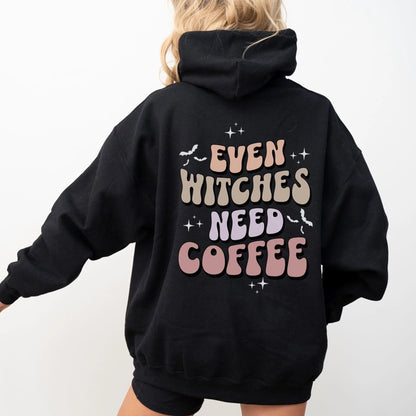 Even Witches Need Coffee hoodie, retro typography, witchy aesthetic, Y2K style.