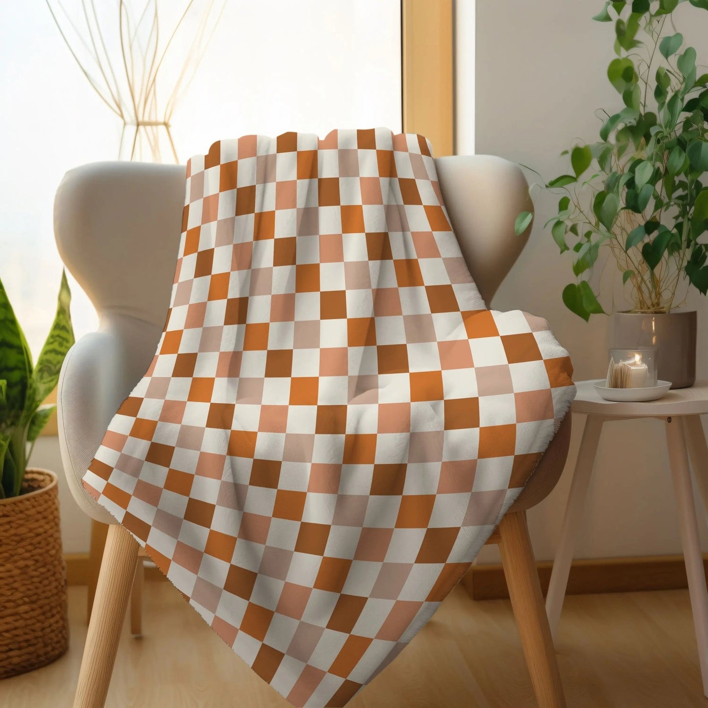 Checkered fall-themed plush blanket in warm autumn colors, perfect for cozy décor.