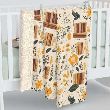 Floral book blanket with a cozy reading design, available in velveteen plush or sherpa fleece.