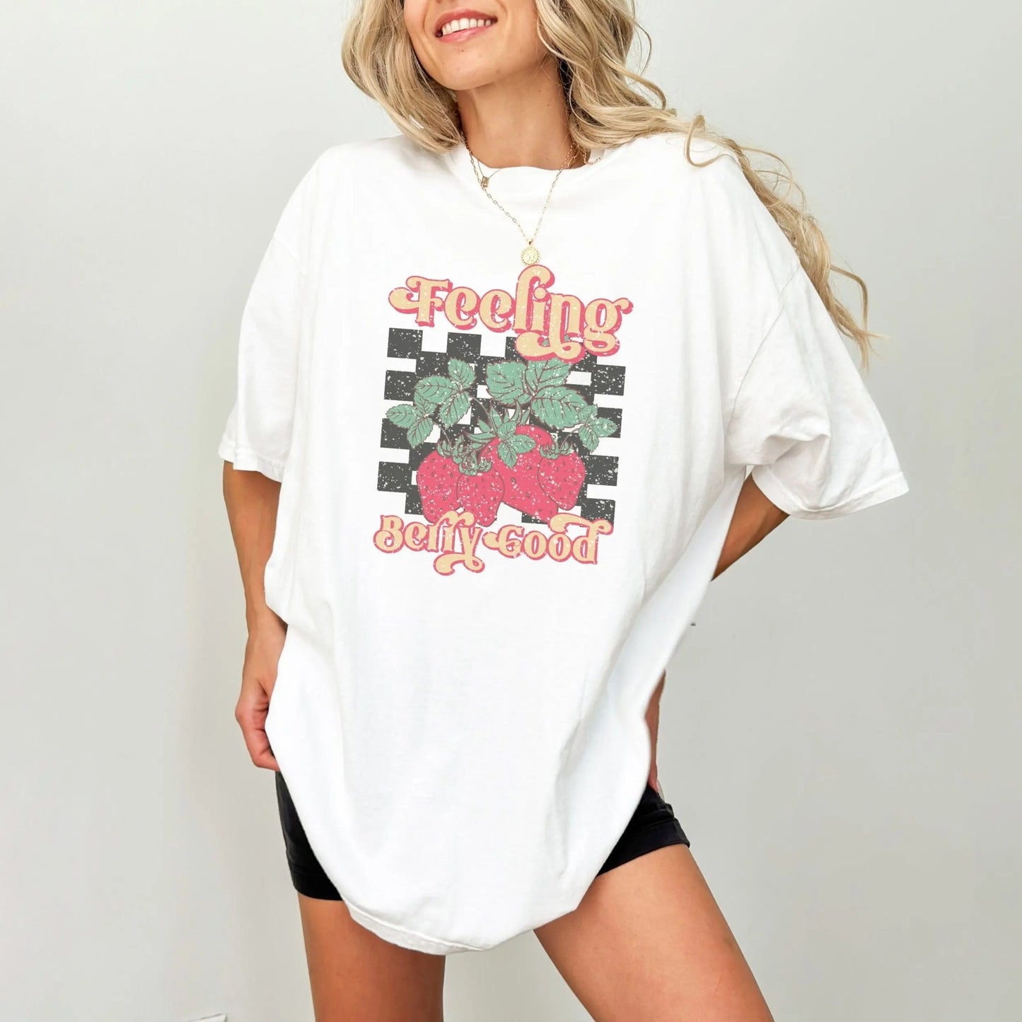 "Feeling Berry Good" shirt with strawberry design, 100% cotton, cute and playful, 7 colors.