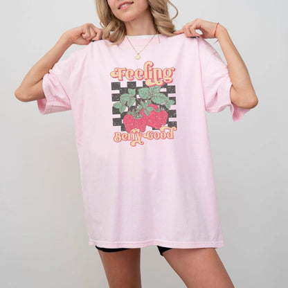 "Feeling Berry Good" shirt with strawberry design, 100% cotton, cute and playful, 7 colors.