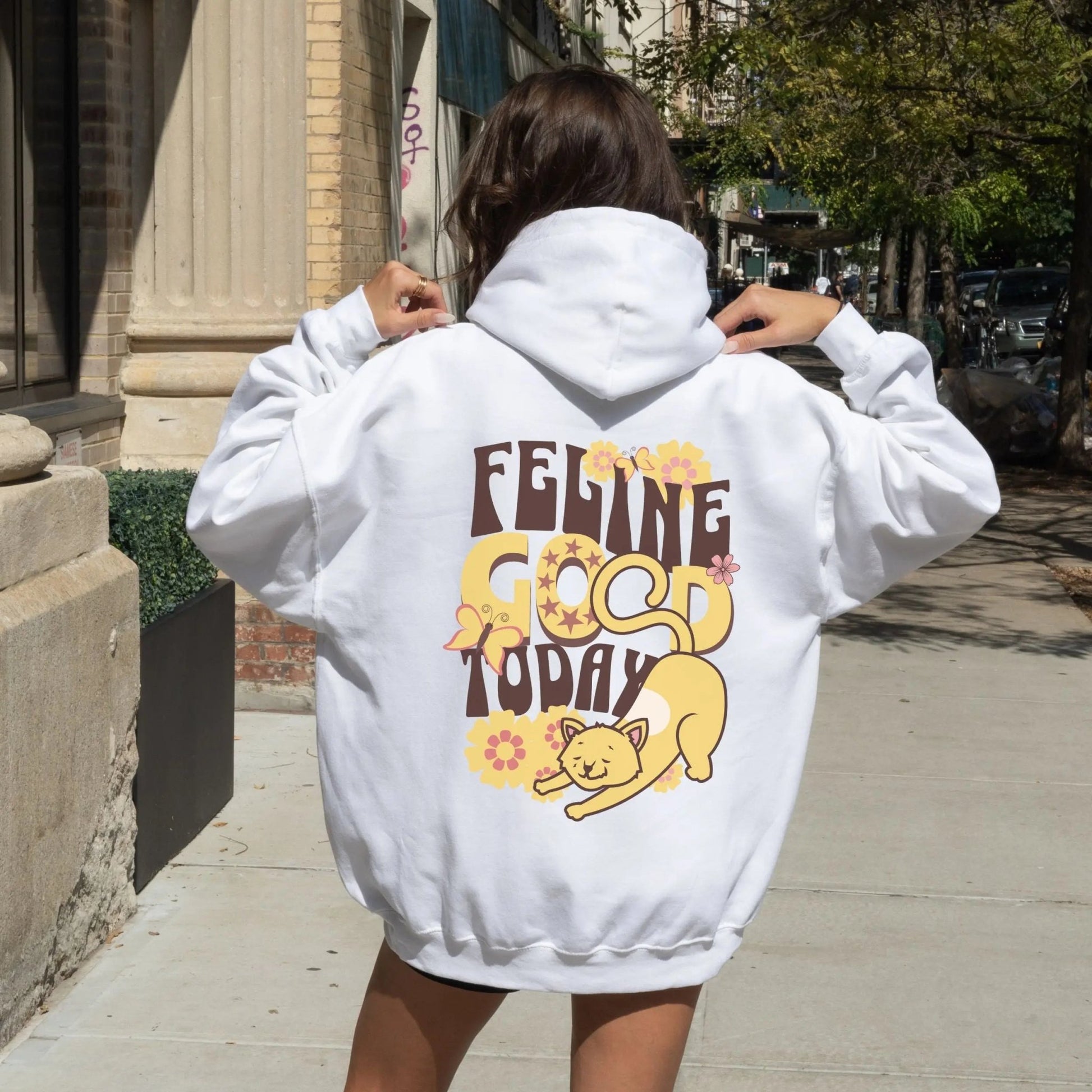 Feline Good hoodie with retro cat design, perfect for cozy vibes and cat lovers.