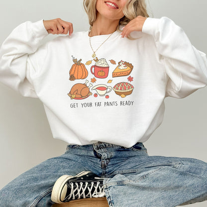 Thanksgiving sweatshirt with a festive food design and "Get Your Fat Pants Ready" text.