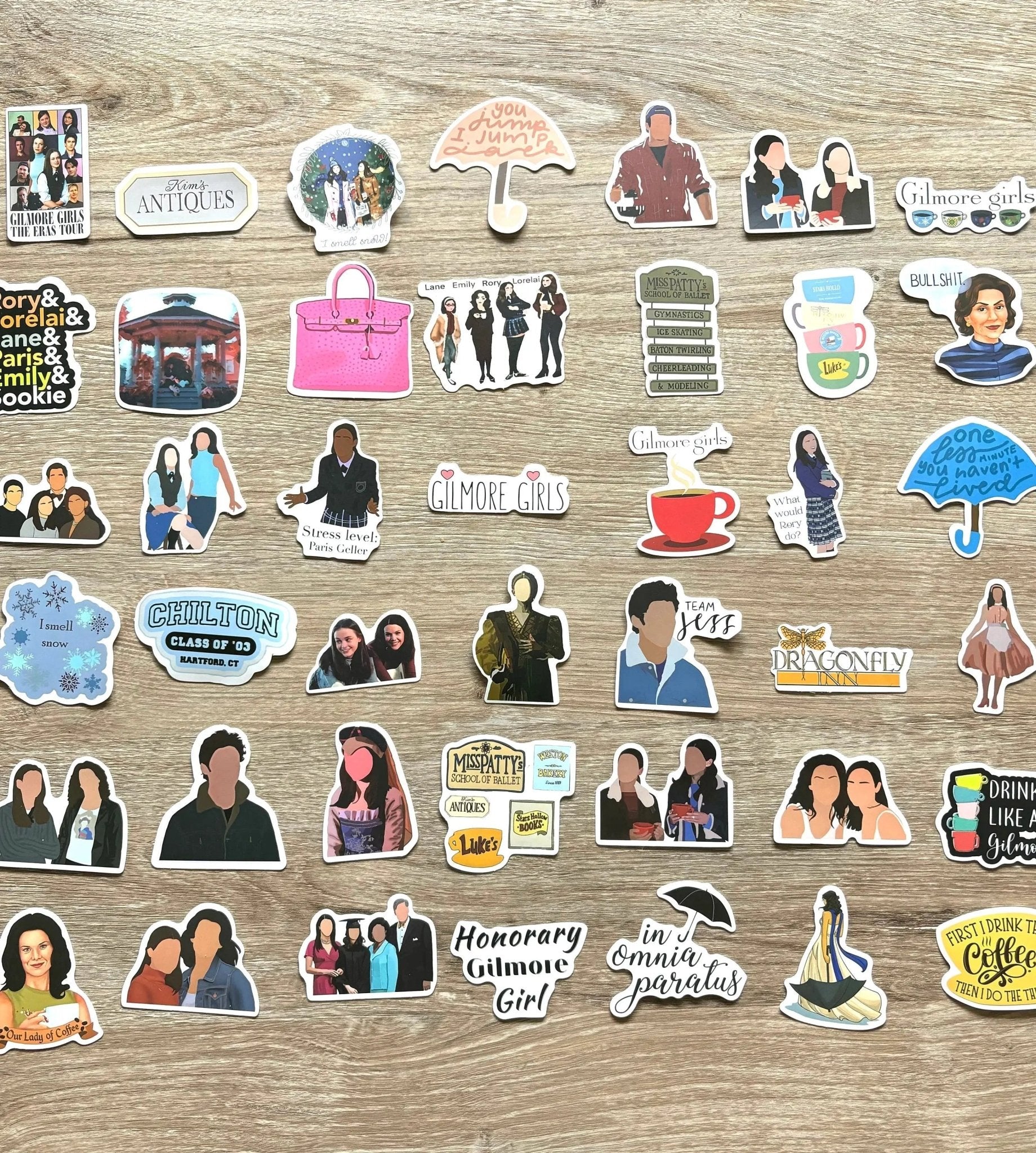 Gilmore Girls vinyl stickers from That Cozy Vibe, packs of 10, 30, or 50, Stars Hollow themed.