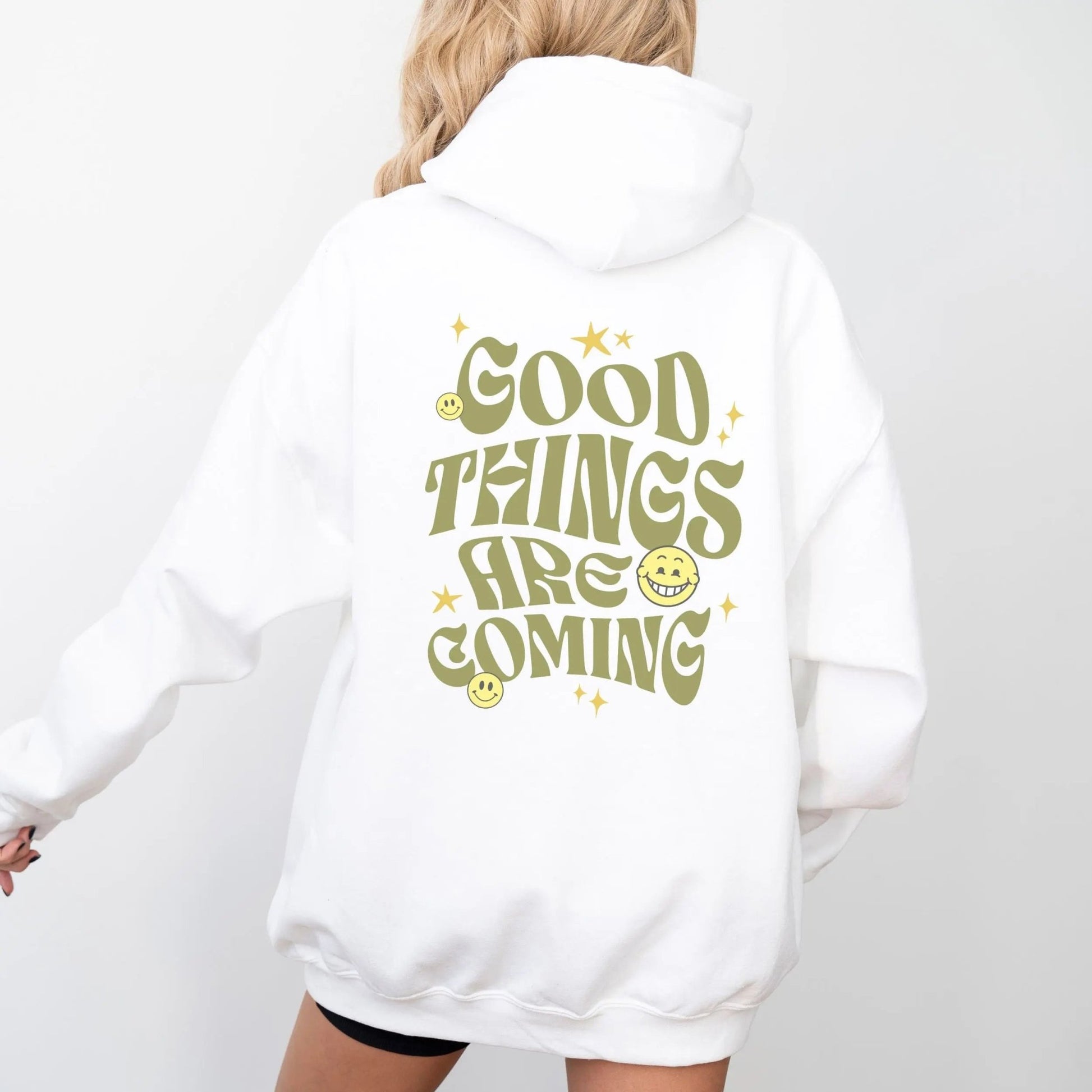 Good Things Are Coming hoodie, Y2K-inspired streetwear, retro typography, smiley faces.