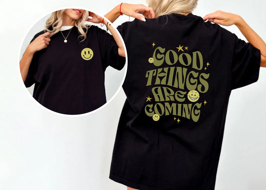 Good Things Are Coming shirt, Y2K-inspired streetwear, retro typography, smiley faces.