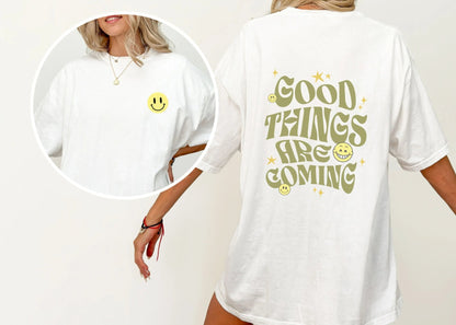 Good Things Are Coming shirt, Y2K-inspired streetwear, retro typography, smiley faces.