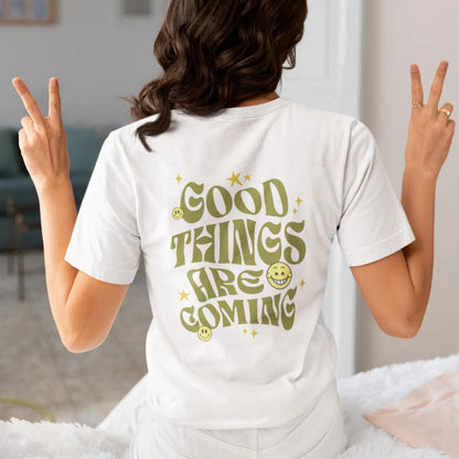 Good Things Are Coming shirt, Y2K-inspired streetwear, retro typography, smiley faces.