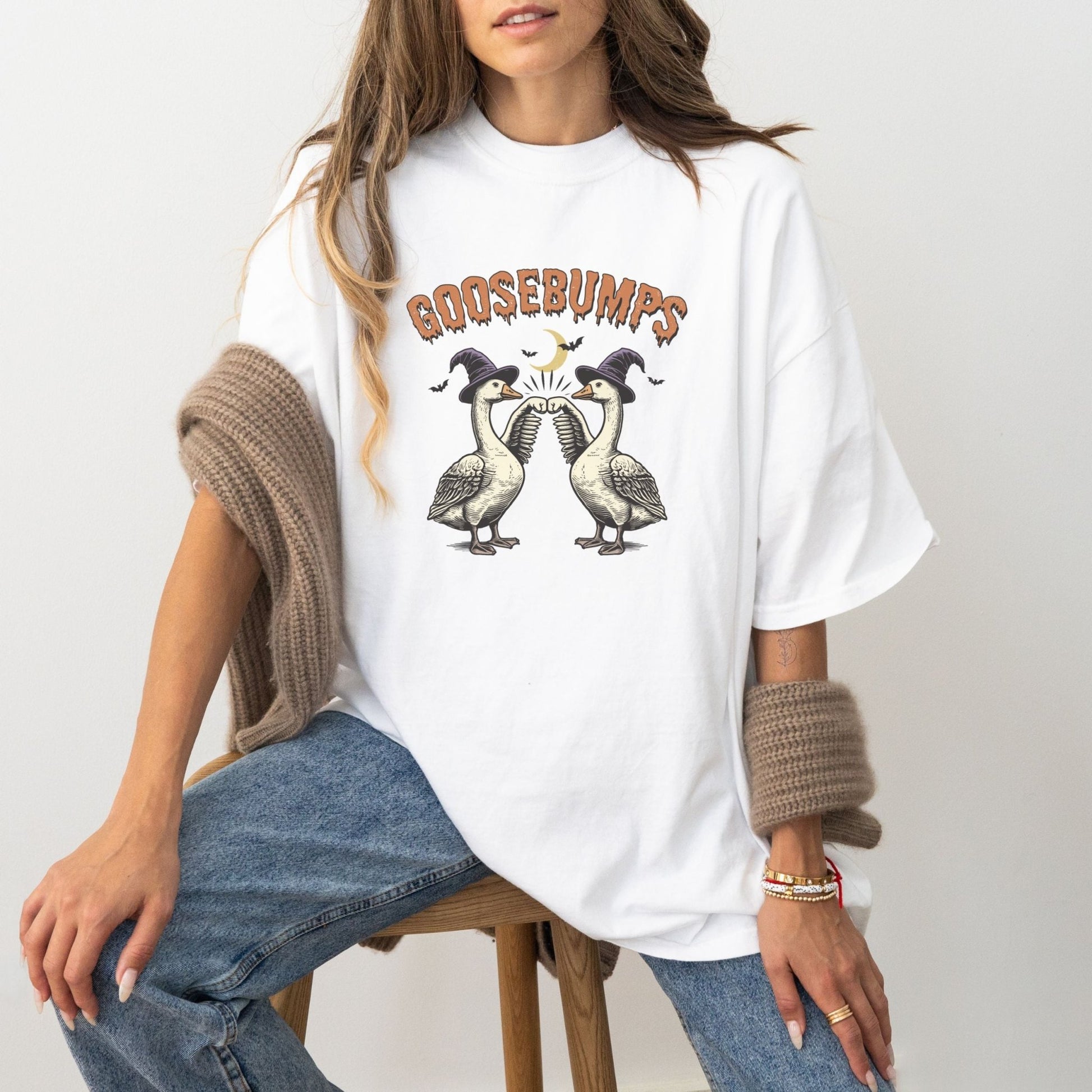 Goosebumps Halloween shirt with spooky geese design.