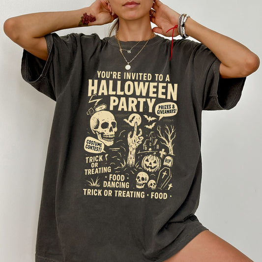 Retro Halloween party skeleton graphic tee with spooky cartoon skulls, tombstones, and vintage lettering