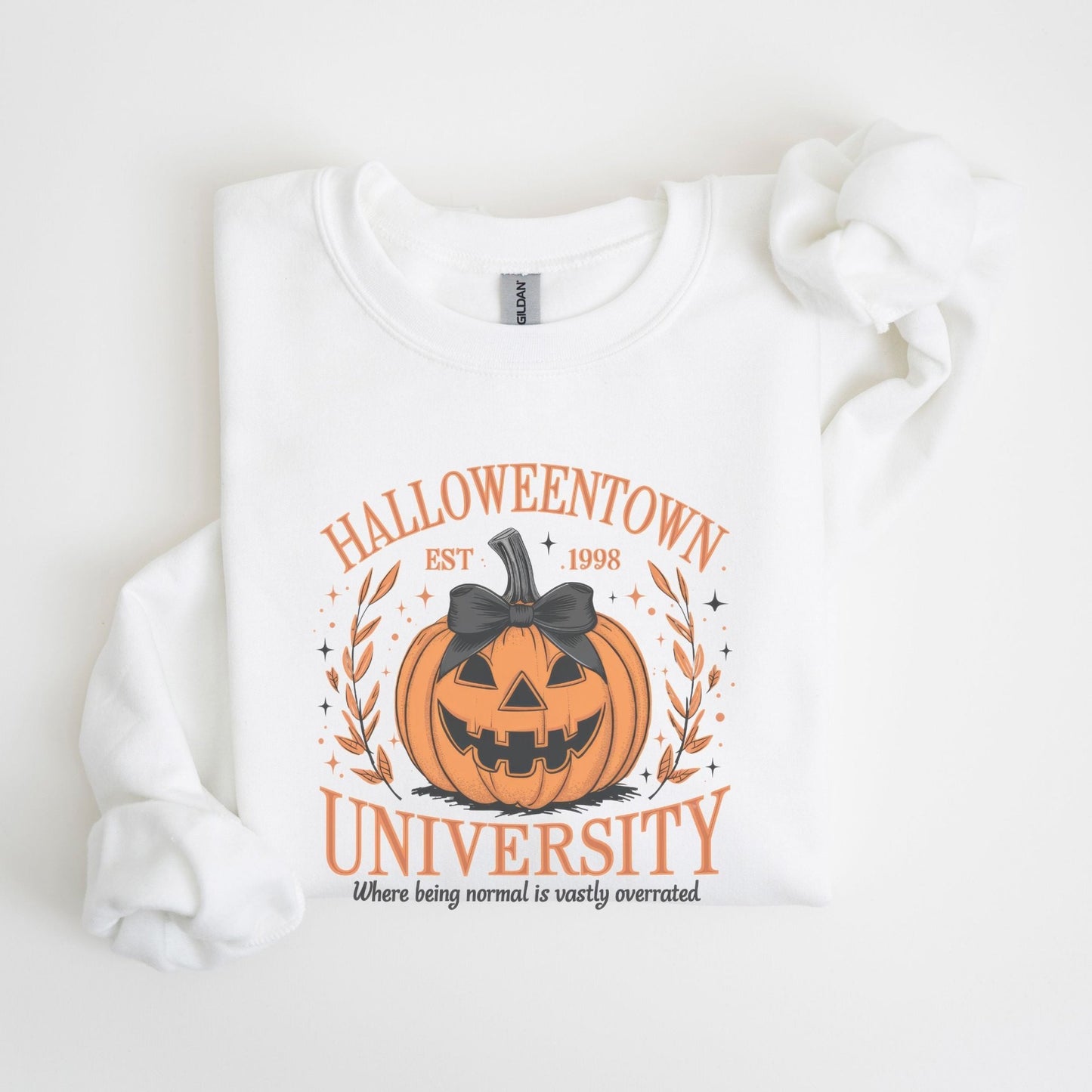 Halloweentown University sweatshirt with a spooky pumpkin design.