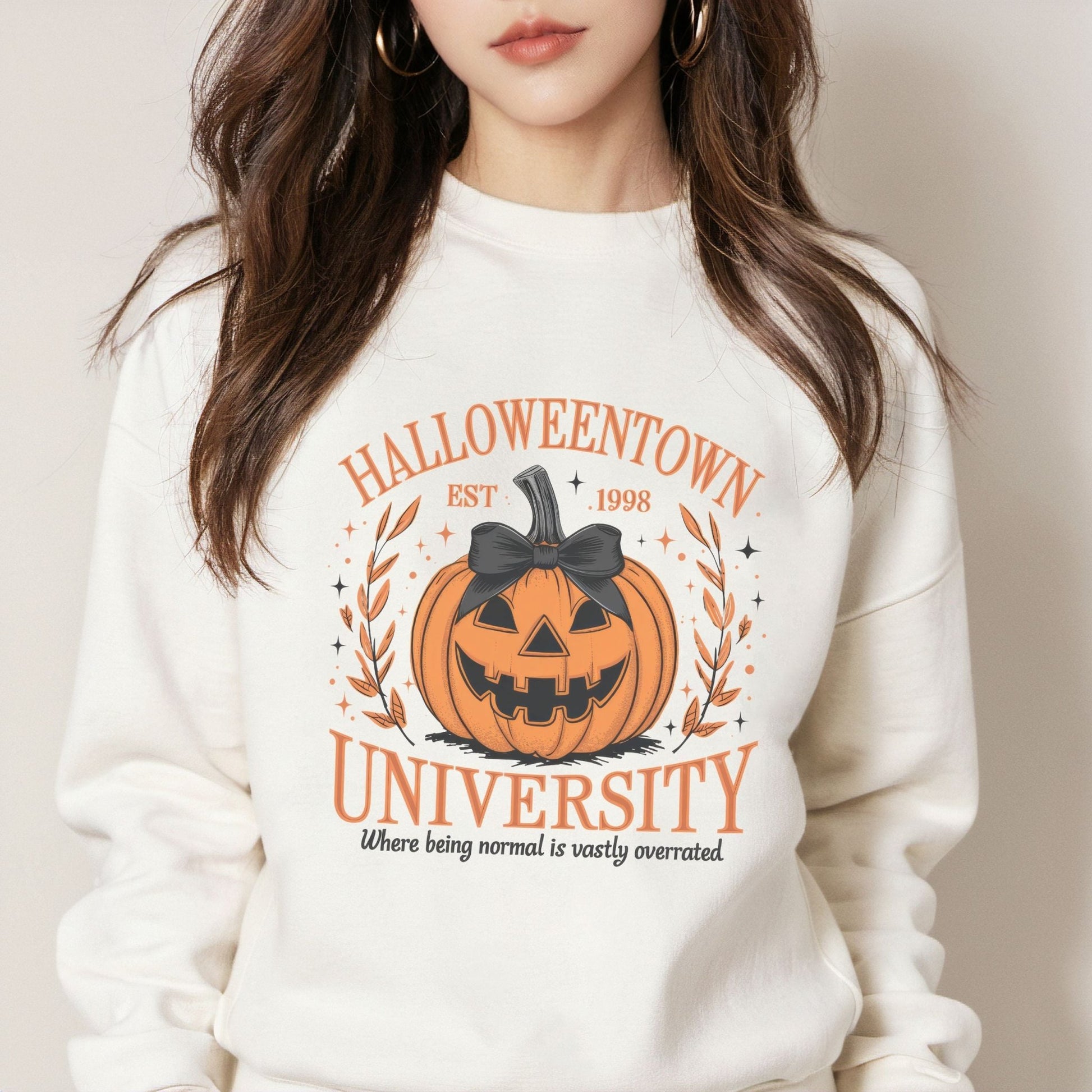 Halloweentown University sweatshirt with a spooky pumpkin design.