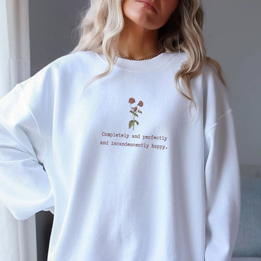 Cozy sweatshirt with Jane Austen quote and floral design, perfect literary gift.