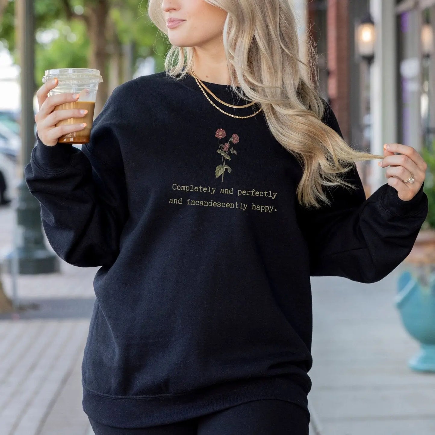 Cozy sweatshirt with Jane Austen quote and floral design, perfect literary gift.