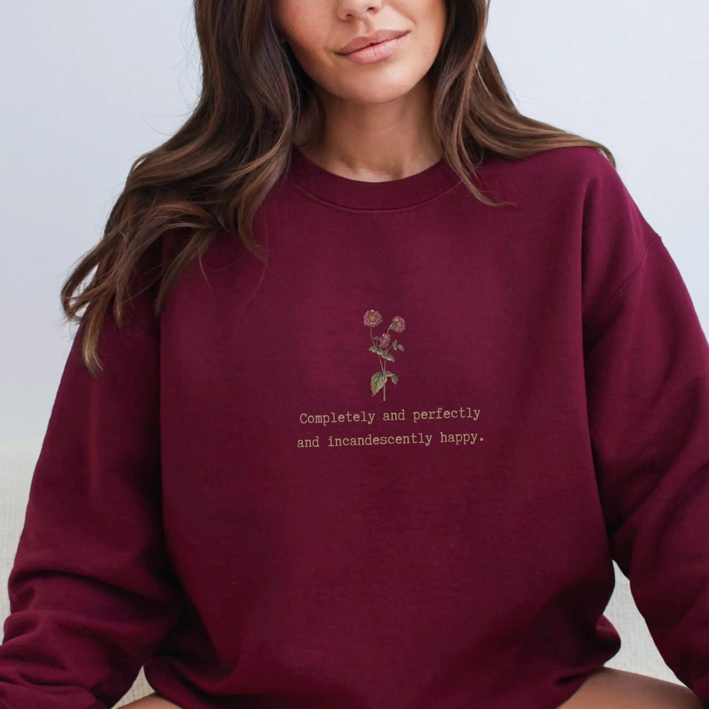 Cozy sweatshirt with Jane Austen quote and floral design, perfect literary gift.