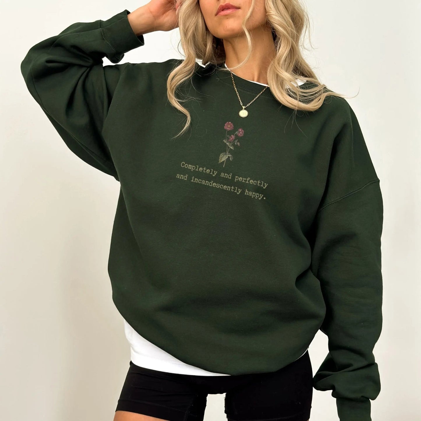 Cozy sweatshirt with Jane Austen quote and floral design, perfect literary gift.