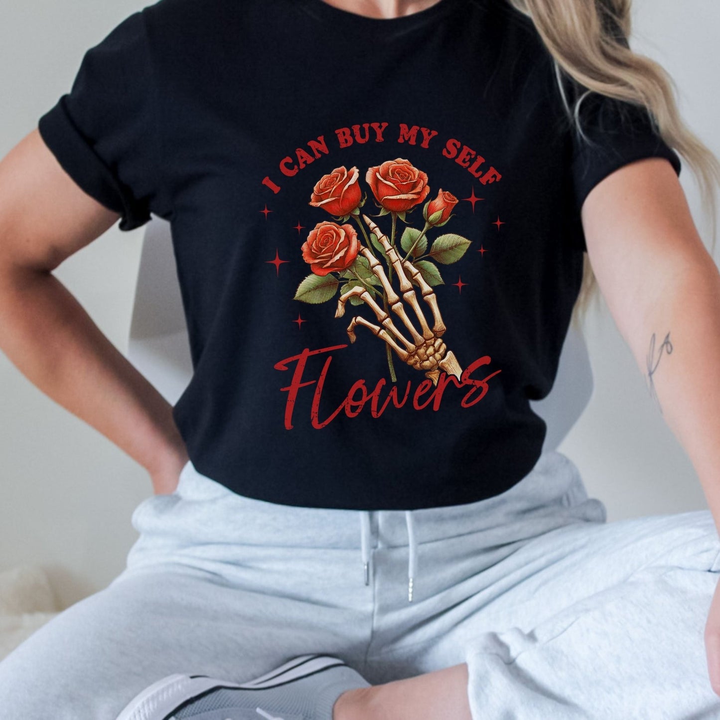 Skeleton rose t-shirt with empowering floral design, available in 4 colors, perfect for self-love and bold fashion.