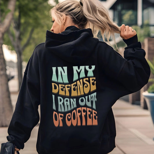 Funny coffee lover hoodie with retro design, perfect for caffeine humor and cozy fashion.