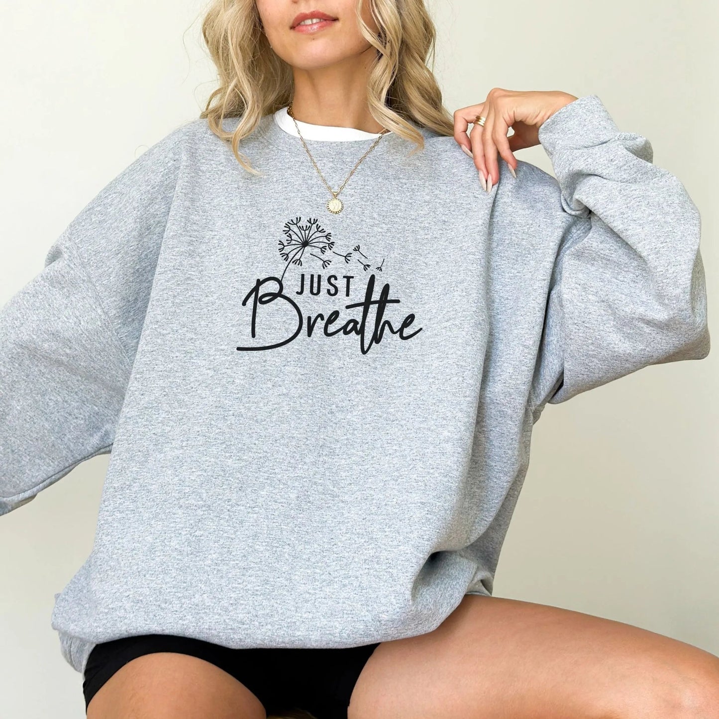 "Just Breathe" sweatshirt from That Cozy Vibe, perfect for mindfulness and wellness.