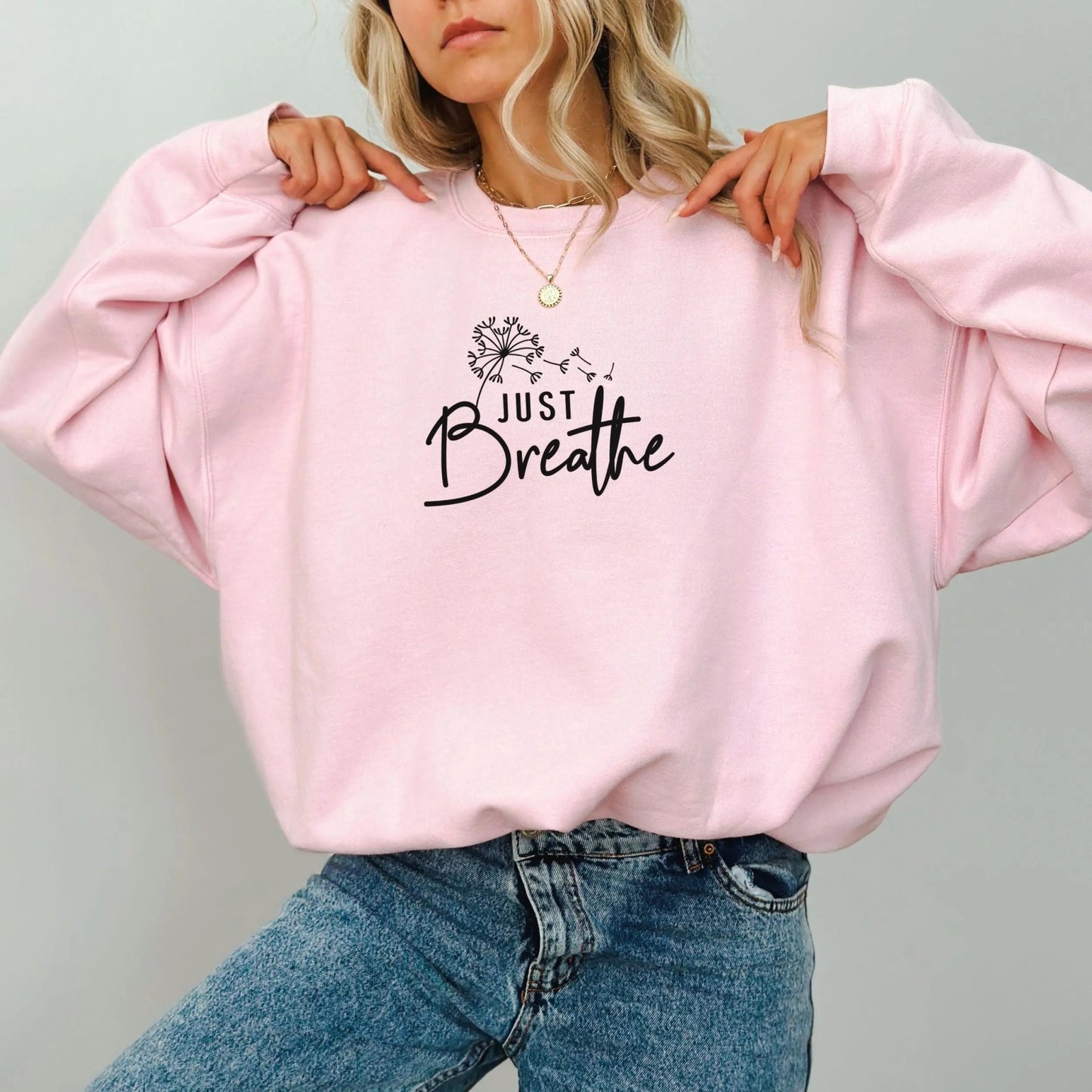 "Just Breathe" sweatshirt from That Cozy Vibe, perfect for mindfulness and wellness.