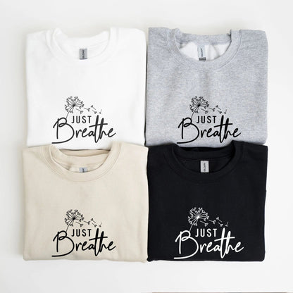 "Just Breathe" sweatshirt from That Cozy Vibe, perfect for mindfulness and wellness.