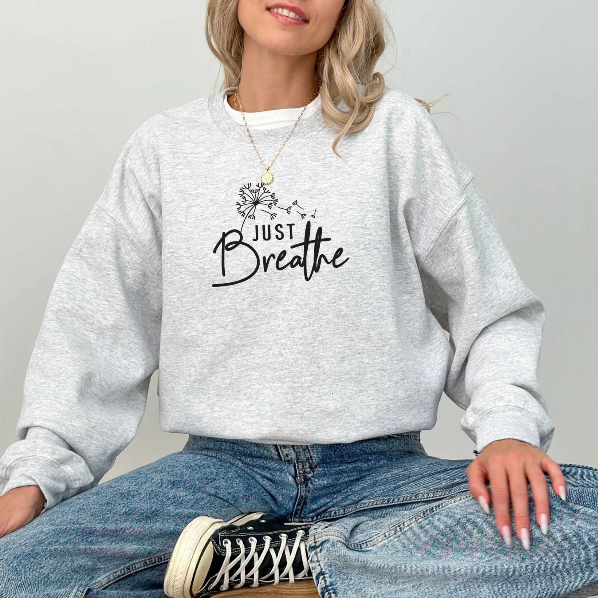 "Just Breathe" sweatshirt from That Cozy Vibe, perfect for mindfulness and wellness.