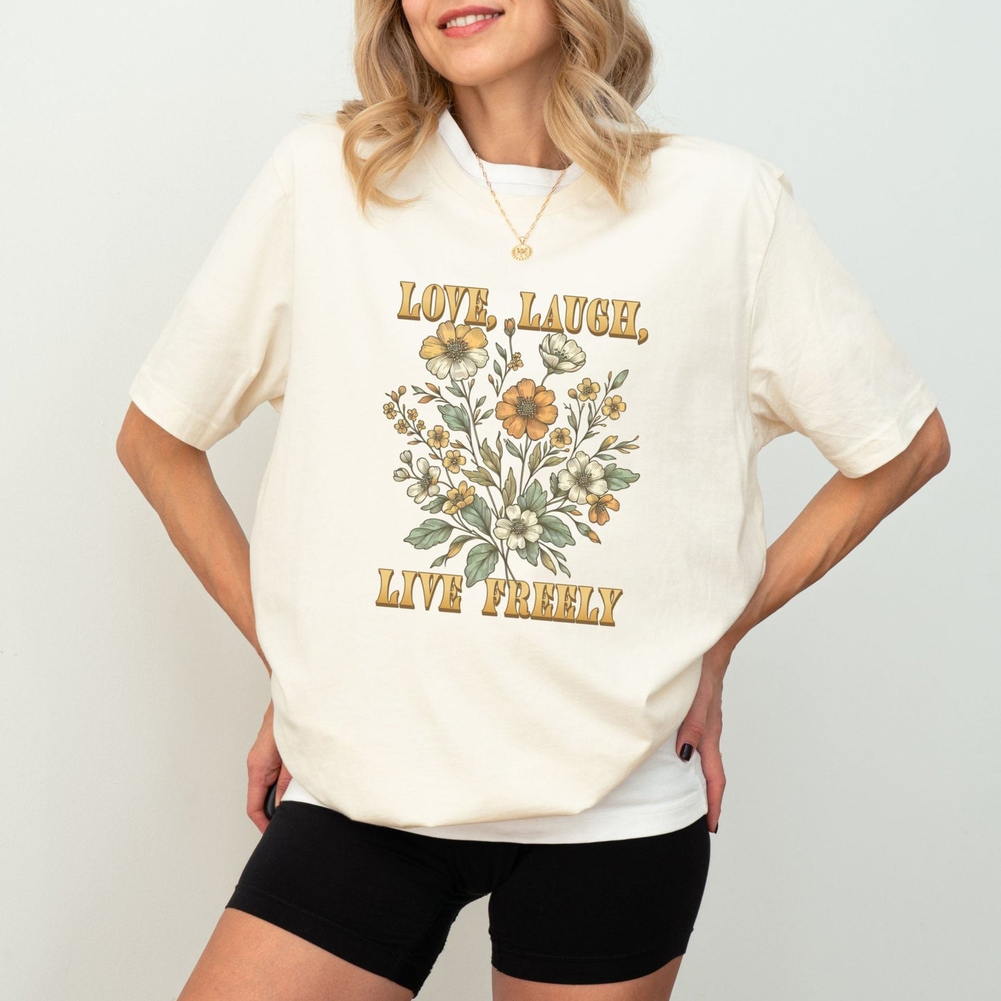 Boho floral shirt with inspirational quote "Love, Laugh, Live Freely" in a vintage floral design, available in 6 colors.