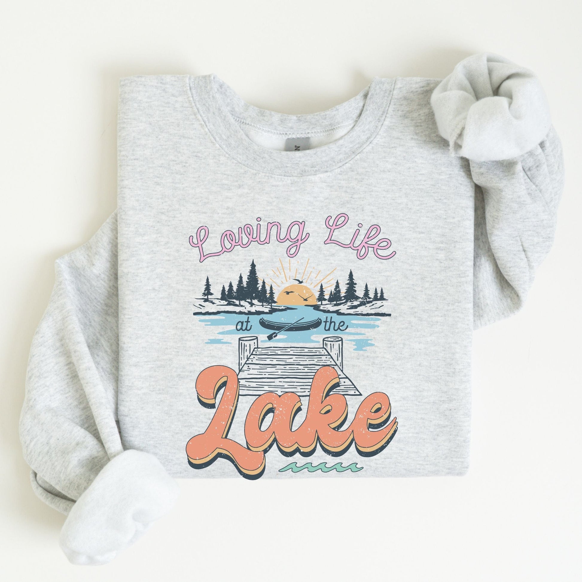 Loving life at the lake sweatshirt with retro dock and sunset graphic