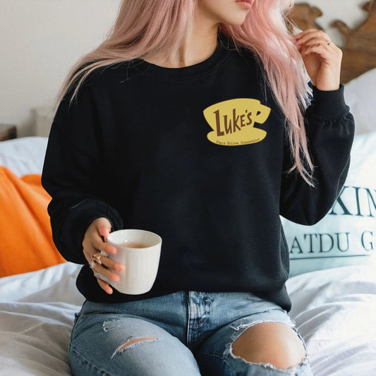 "Luke's Diner" sweatshirt, cozy Gilmore Girls merch, warm and comfortable, perfect for fans.