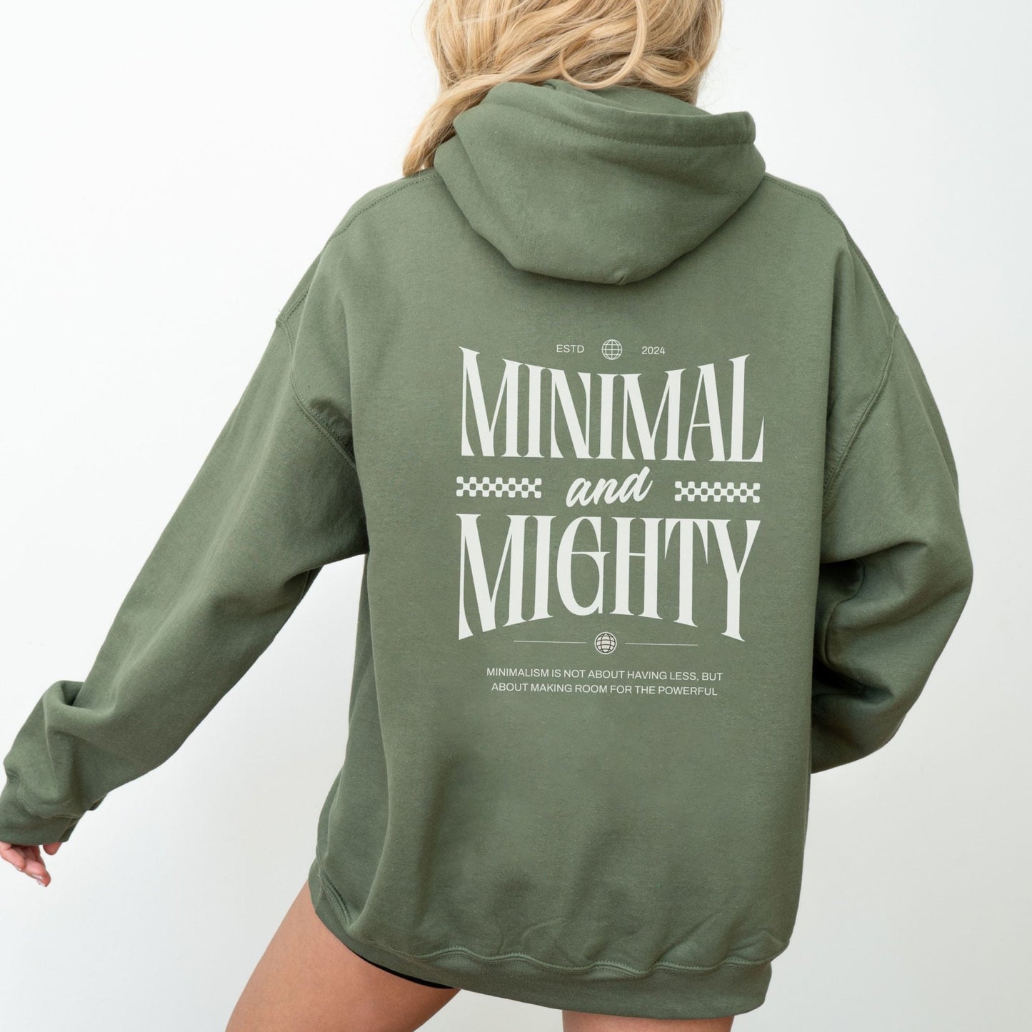 Minimal and Mighty hoodie with bold typography design.