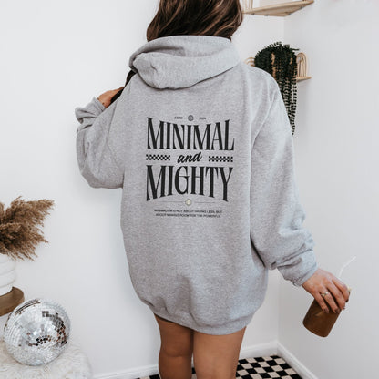 Minimal and Mighty hoodie with bold typography design.