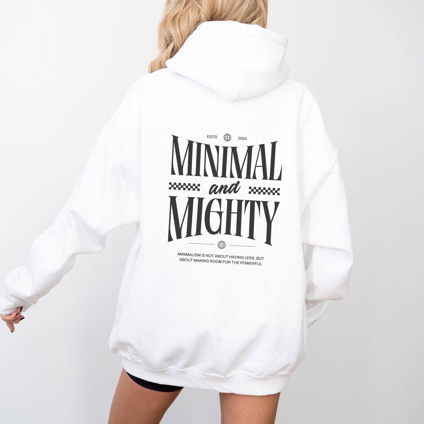 Minimal and Mighty hoodie with bold typography design.