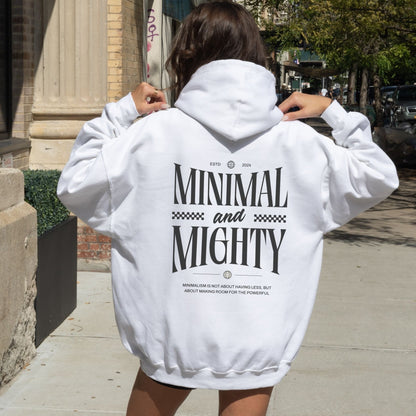 Minimal and Mighty hoodie with bold typography design.