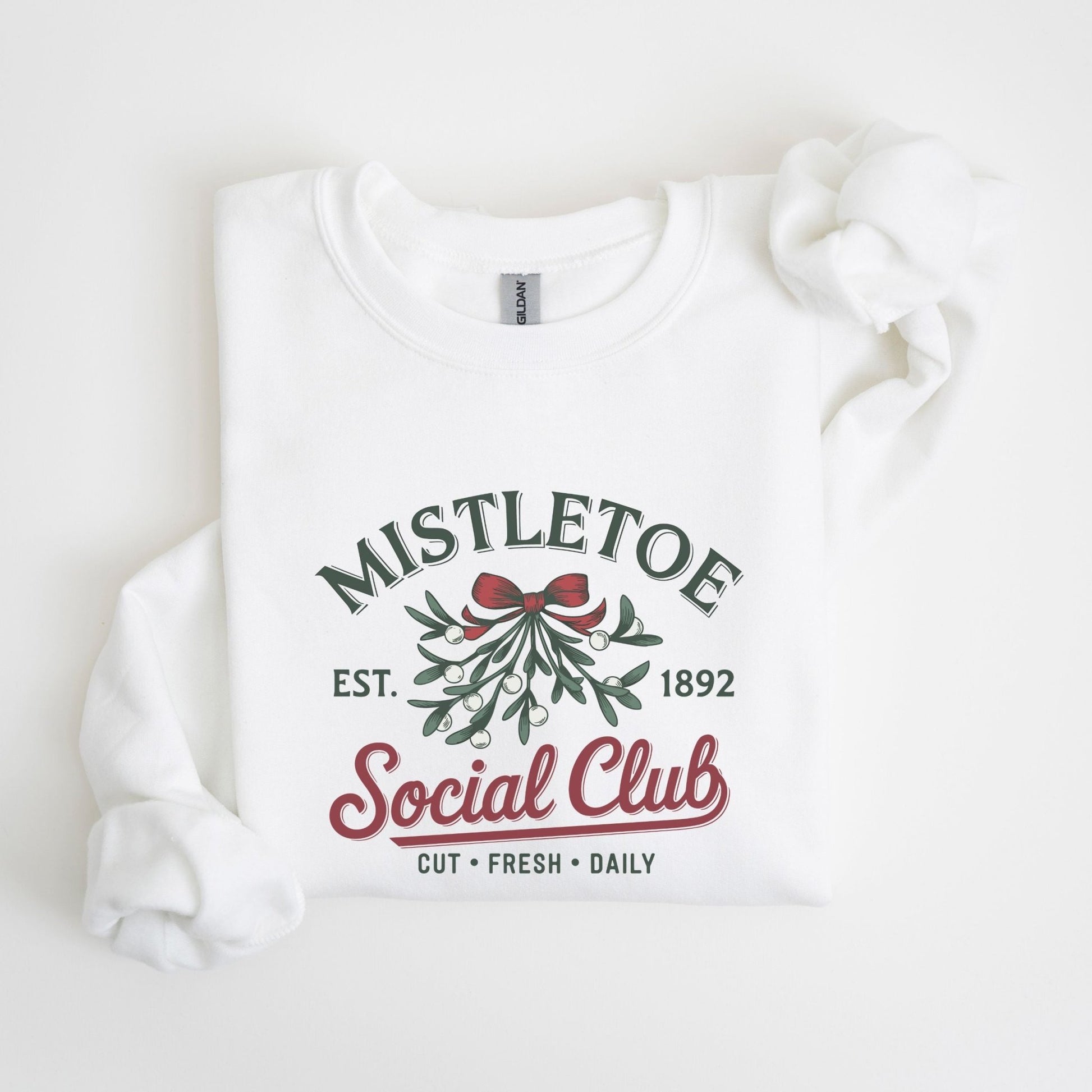 Mistletoe social club holiday sweatshirt with vintage Christmas design.