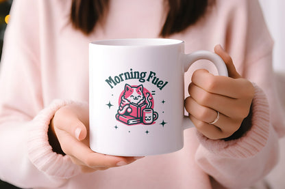 Ceramic mug with a cozy cat and coffee design, ideal for book and coffee lovers.