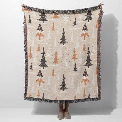 Woven fringe blanket with festive Christmas tree pattern, perfect for cozy holiday decor.