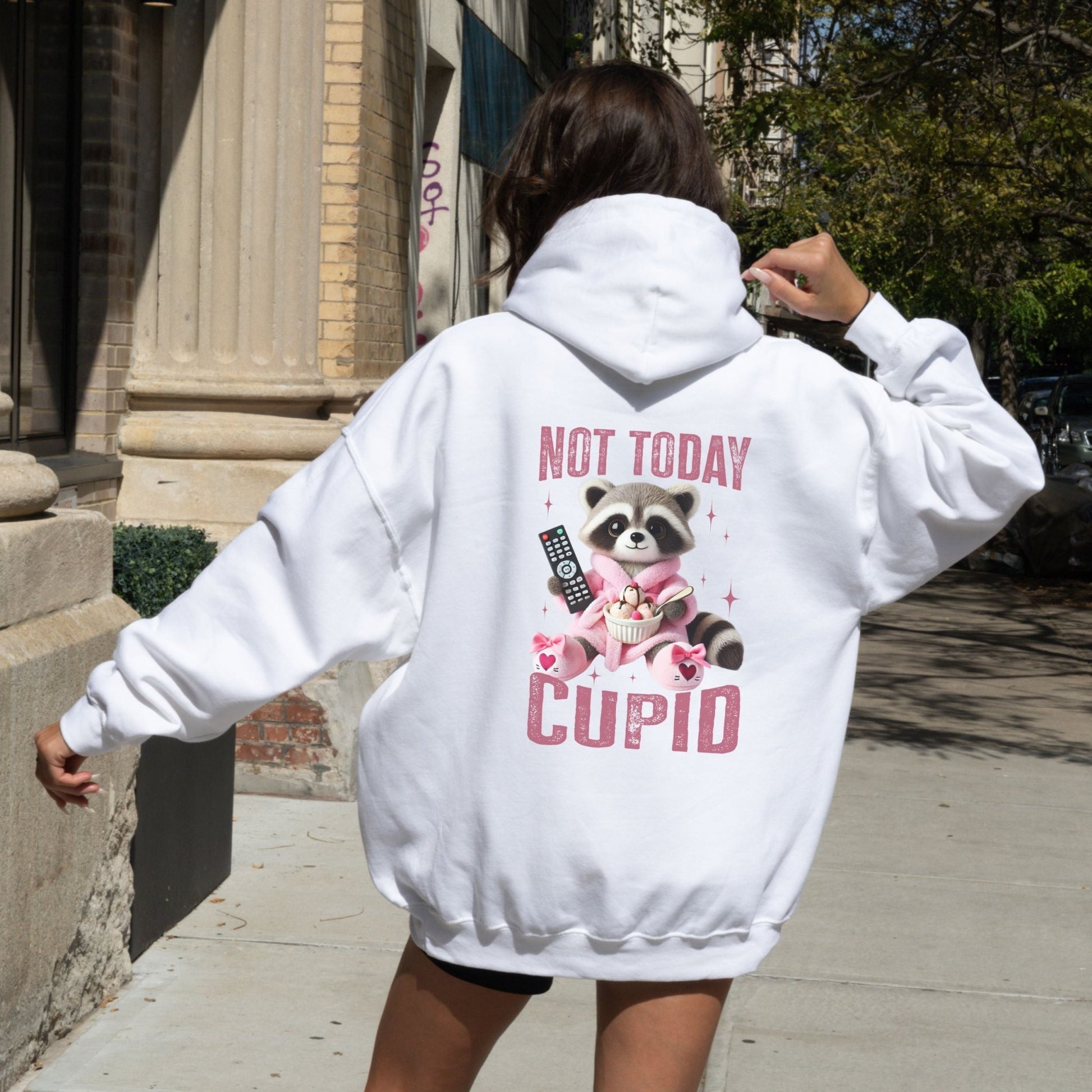 Not Today Cupid hoodie with a funny raccoon graphic, cozy and sassy Valentine's Day humor apparel.