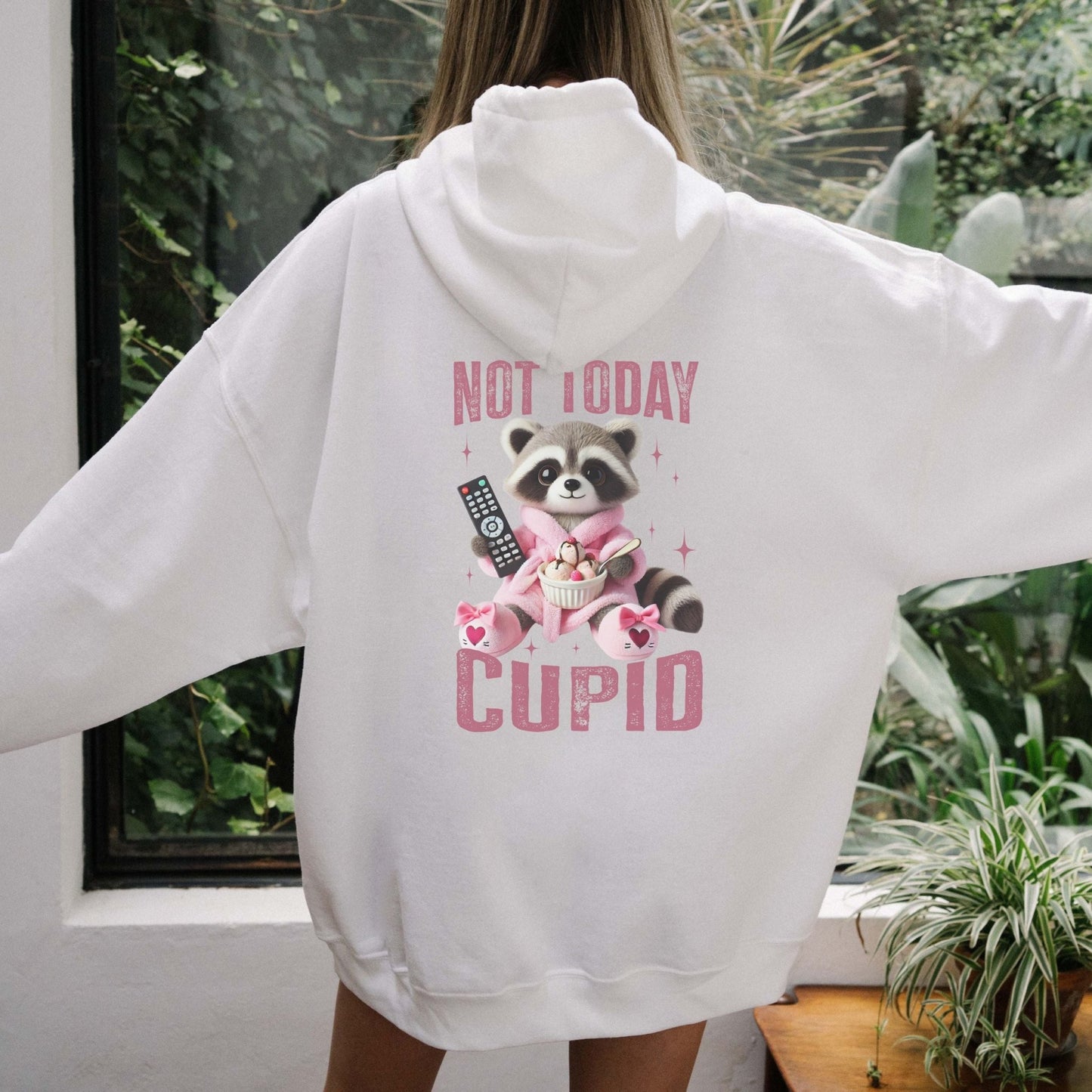 Not Today Cupid hoodie with a funny raccoon graphic, cozy and sassy Valentine's Day humor apparel.