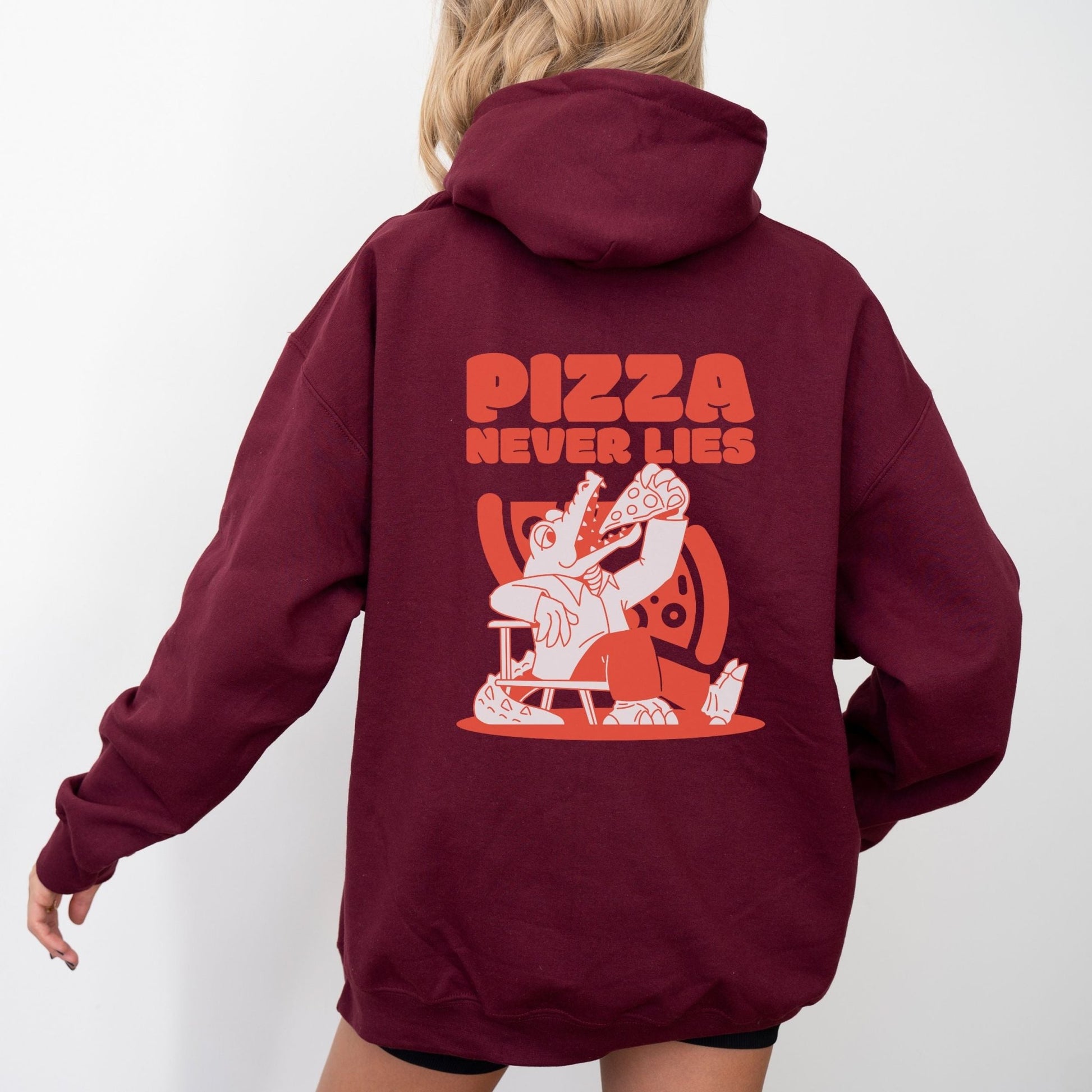 Pizza lover hoodie with a quirky alligator eating pizza design.