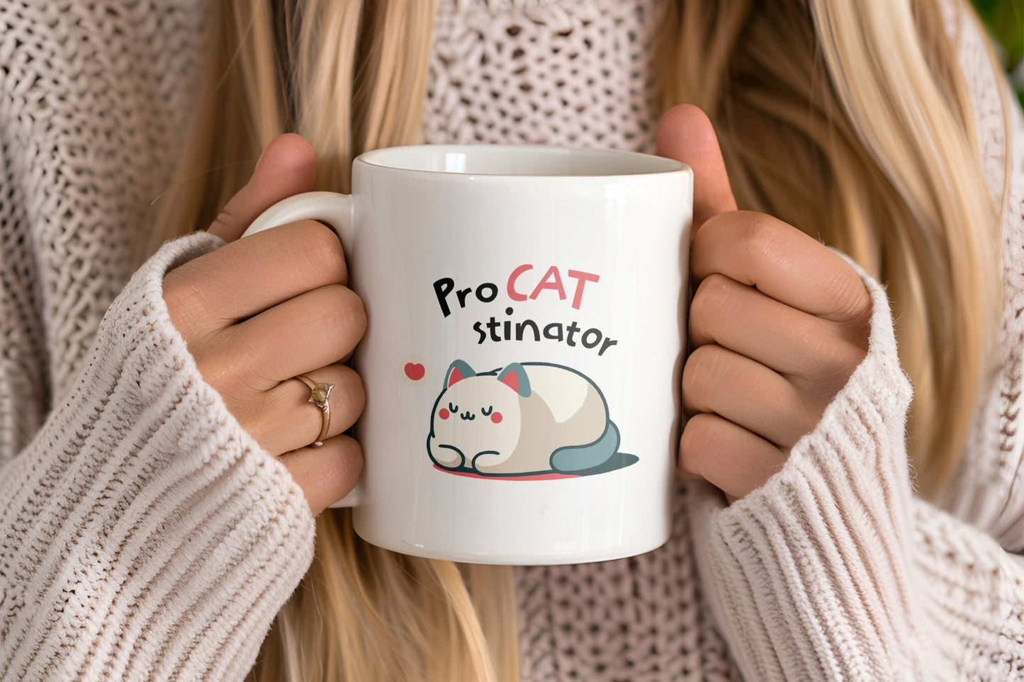 Cozy ceramic mug with cute cartoon cat design, ideal for cat lovers.