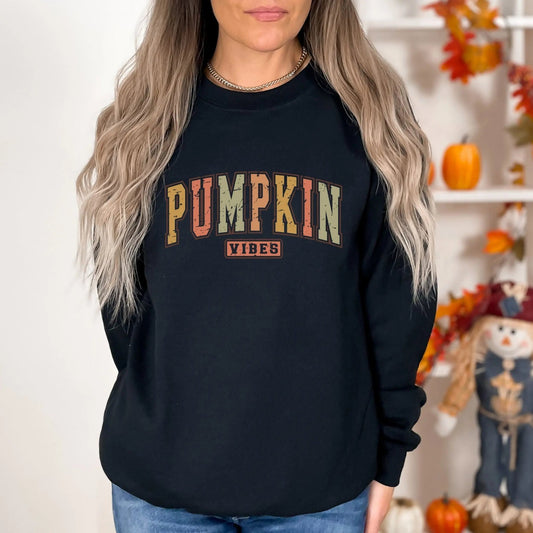 Pumpkin Vibes sweatshirt, 50% cotton, 50% polyester, fall fashion, Halloween theme.