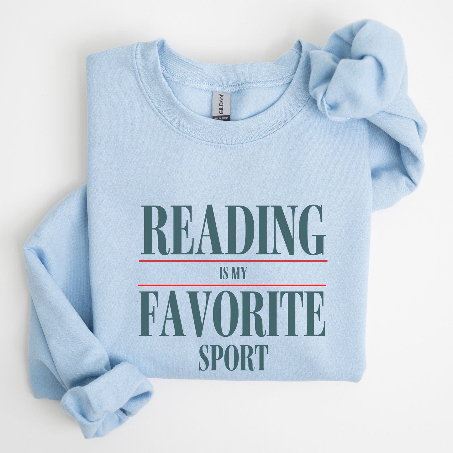 “Reading is My Favorite Sport” sweatshirt with bold varsity-style typography — cozy reader crewneck for book lovers and literary fans.