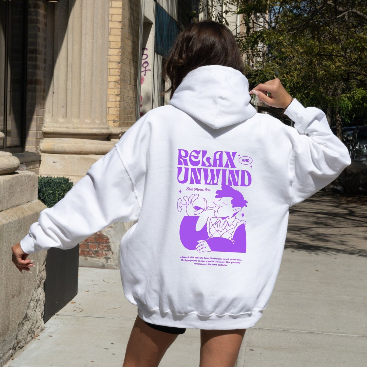 Retro Relax and Unwind hoodie with pastel graphic design, perfect cozy chill-day apparel.